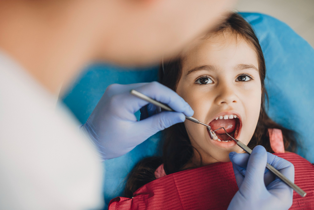 criança no odontopediatra