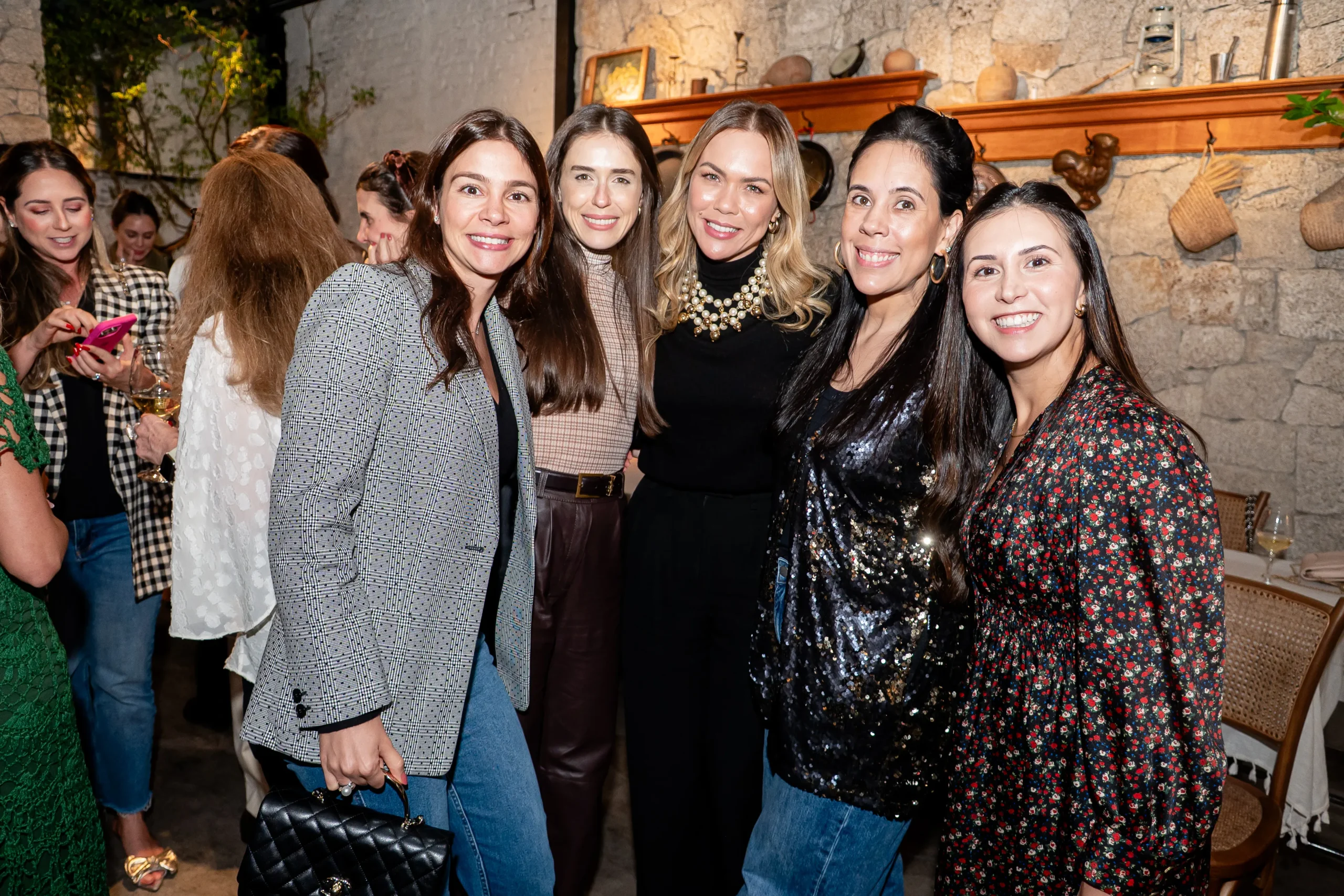 Mulheres no evento de Inteligência Artificial das Mães da Pracinha da Vila Nova Conceição e Just Real Moms